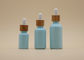 बांस कोटिंग के साथ रंग कोटिंग स्काई ब्लू 15 मिलीलीटर 30 मिलीलीटर आवश्यक तेल की बोतलें