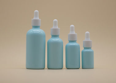 व्यक्तिगत देखभाल के लिए ब्लू कोटिंग आवश्यक तेल ड्रॉपर की बोतलें सफेद सिरेमिक बोतल